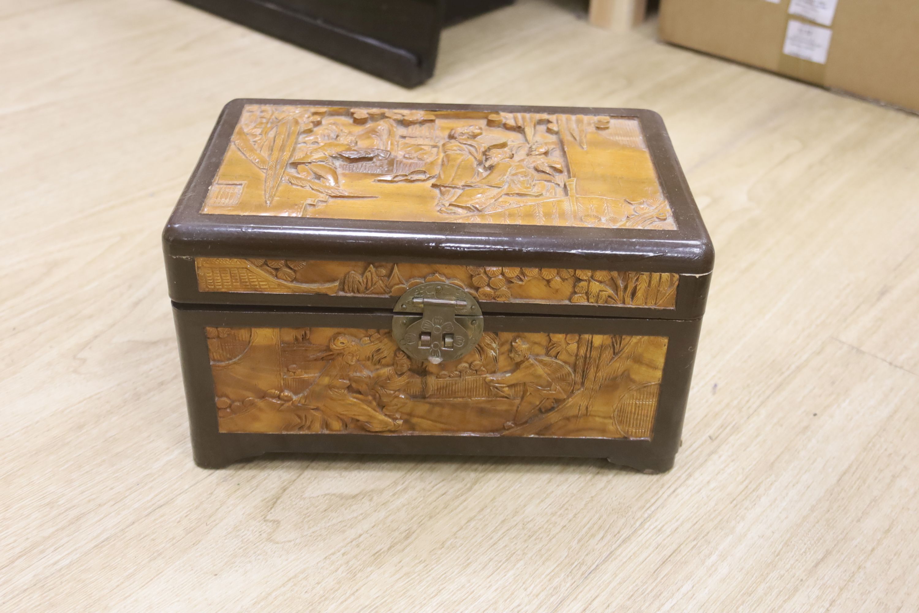 A quantity of Chinese and other carved wood boxes and wood carvings